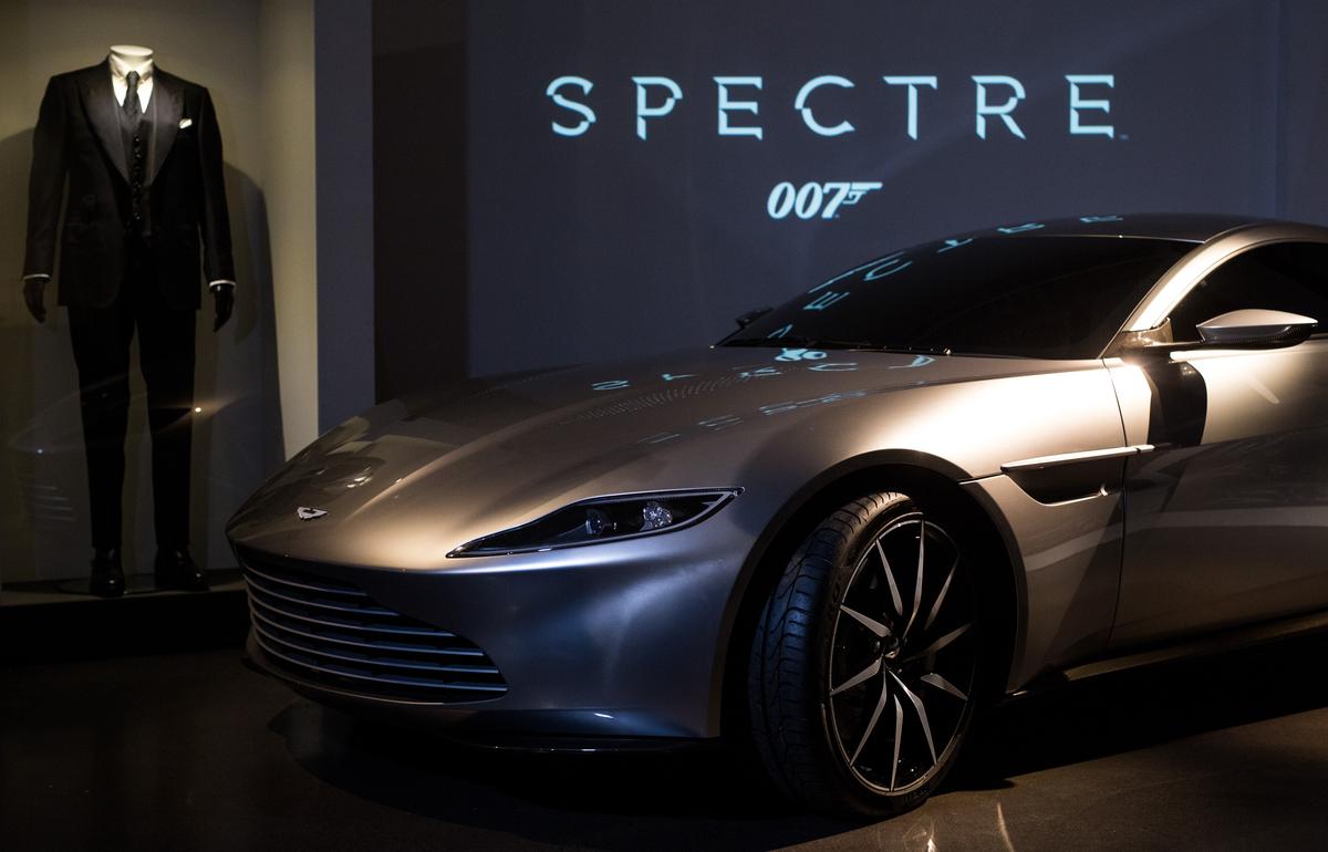 An Aston Martin DB10, produced exclusively for Spectre, and a James Bond costume on display at the London Film Museum.