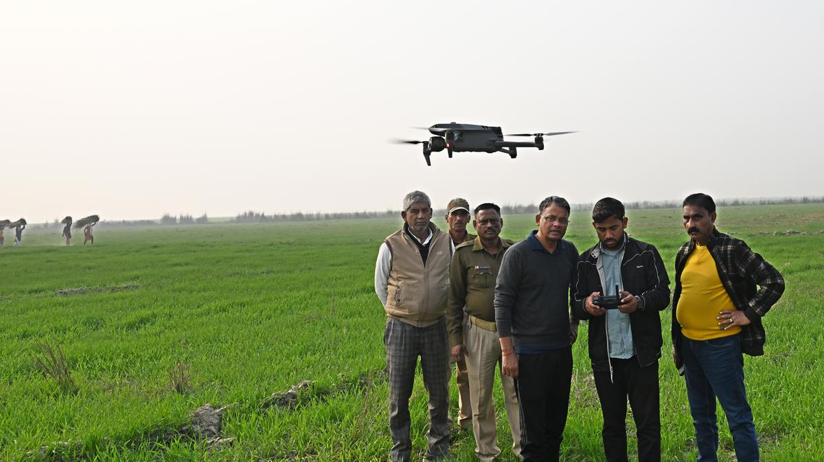 R.S Yadav, DFO along with team during combing operation on the river bed of Ghaghara river near the villages effected with wolf terror in Bahraich district So far three wolfs killed and one injured here during the operation equipped with drones, sharp shooter and other gadgets. 