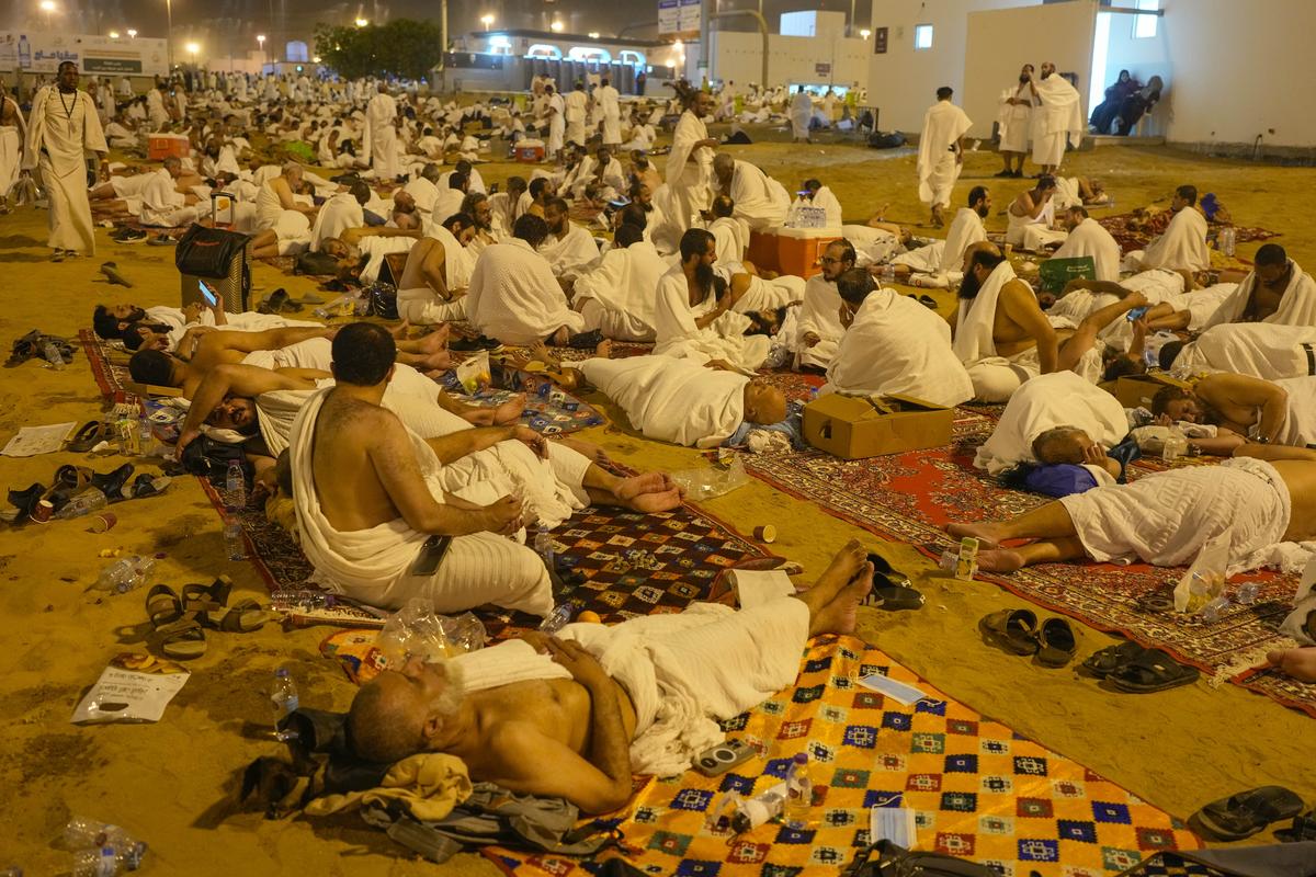 Muslim pilgrims rest in Muzdalifah, on the second day of the annual hajj pilgrimage, near the holy city of Mecca, Saudi Arabia, on June 15, 2024. 