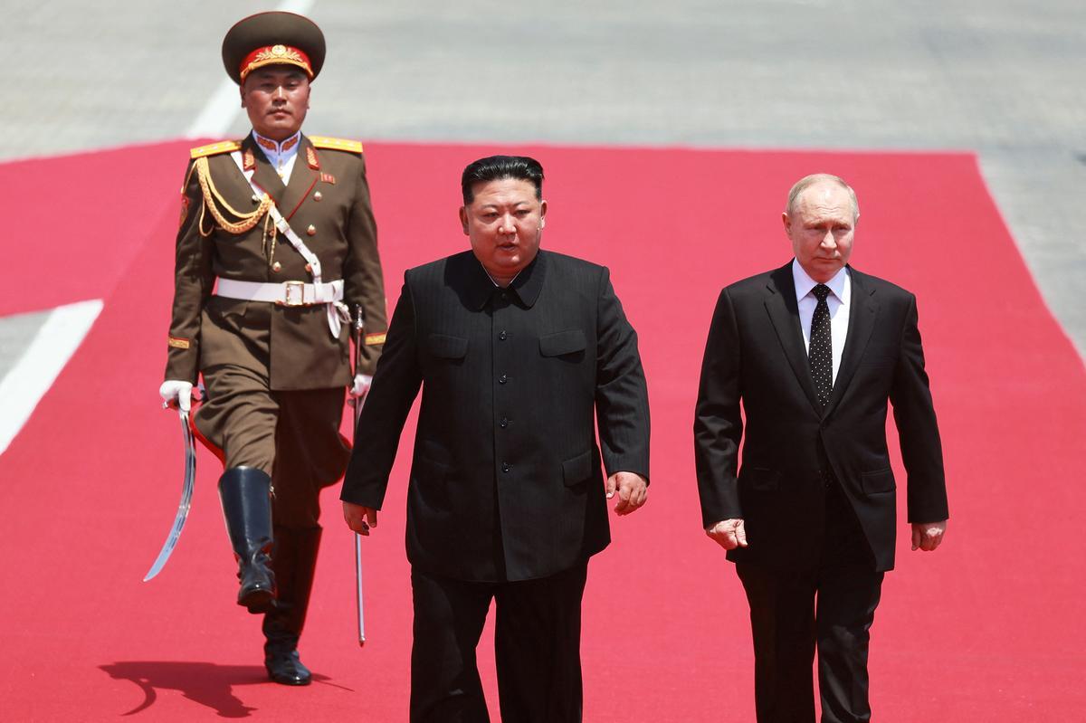 Russia’s President Vladimir Putin and North Korea’s leader Kim Jong Un attend an official welcoming ceremony at Kim Il Sung Square in Pyongyang, North Korea on June 19, 2024. 
