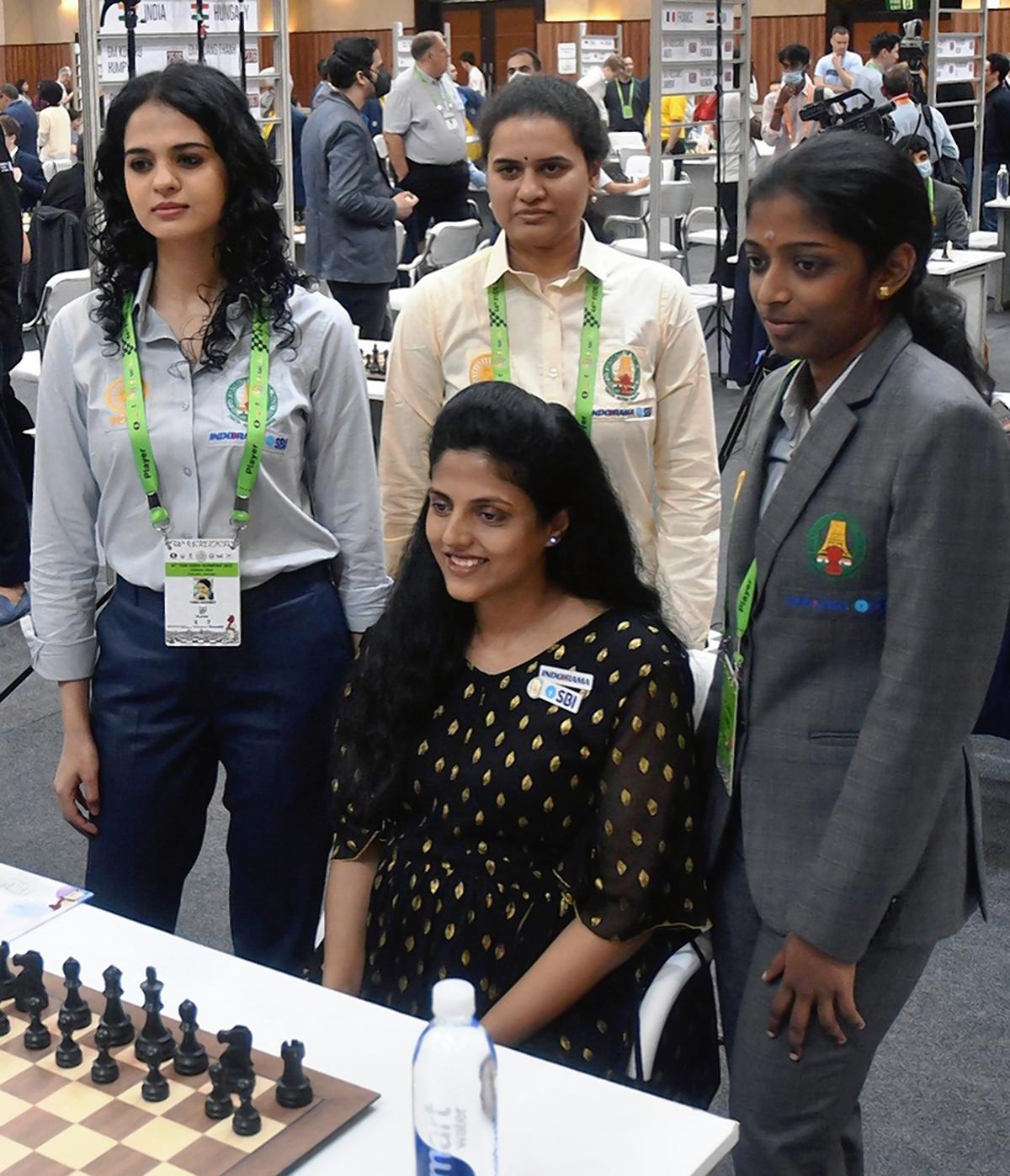 Tania Sachdev, GM Koneru Humpy, GM Dronavalli Harika (seated), and R. Vaishali, pose on day 4 of the 44th Chess Olympiad at Mamallapuram on Monday, August 1. 