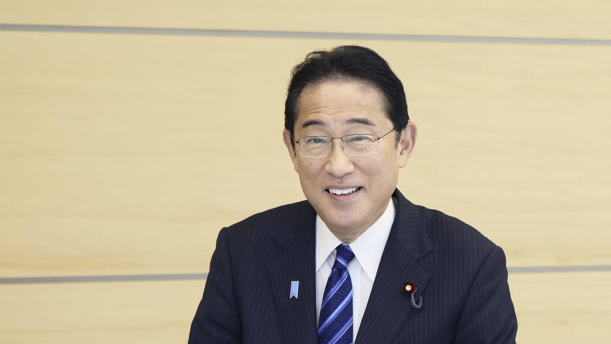 Japan PM eats 'safe and delicious' Fukushima fish