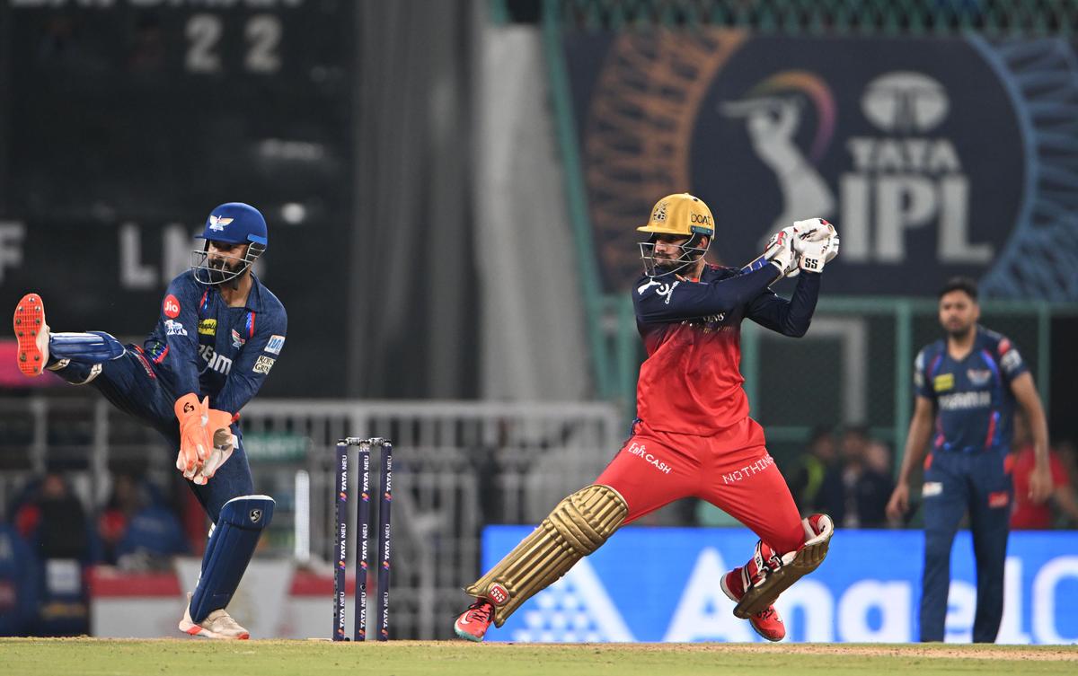 Jitesh Sharma of Royal Challengers Bengaluru drives Shahbaz Ahmed of Lucknow Super Giants during their IPL match at Ekana stadium, in Lucknow on Tuesday,  May 27, 2025.