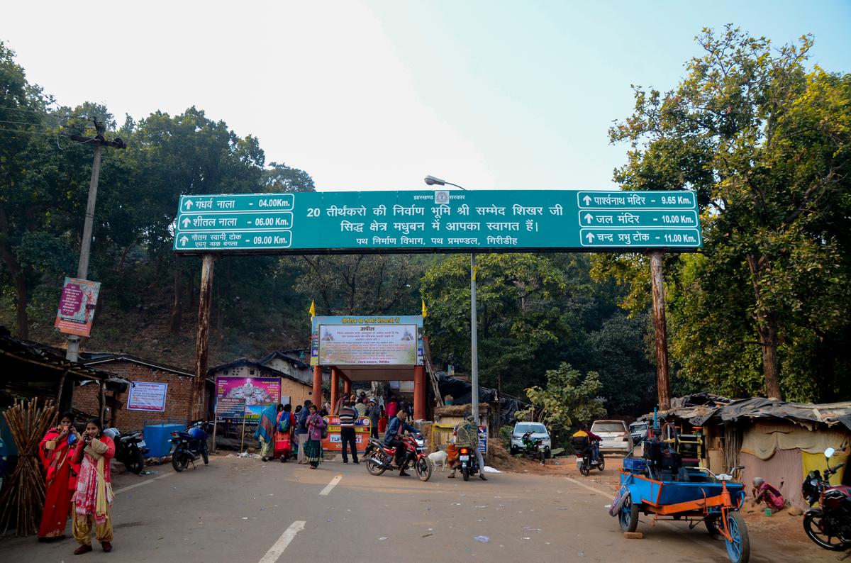 At the entry from Madhuban, the Adivasi worship site does not find space on the signboard.