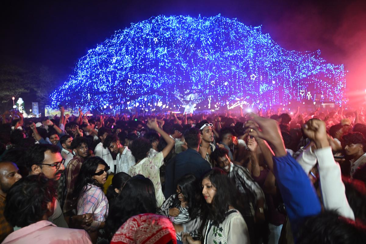 People celebrating near the gigantic Christmas Tree set up at Veli Ground