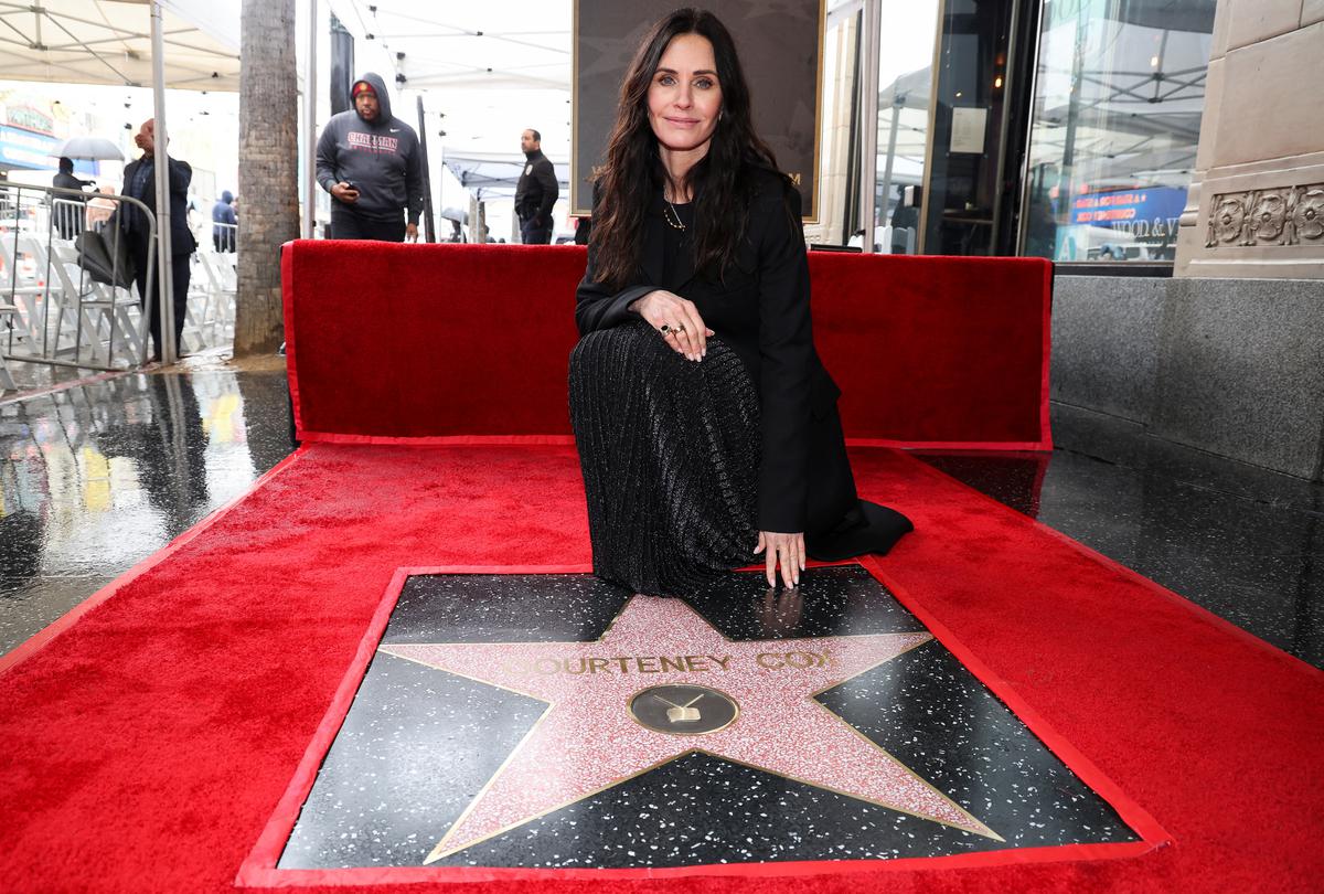 Actress Courteney Cox poses during her star unveiling ceremony on the Hollywood Walk of Fame in Los Angeles, California, US, February 27, 2023.  REUTERS/Mario Anzuoni