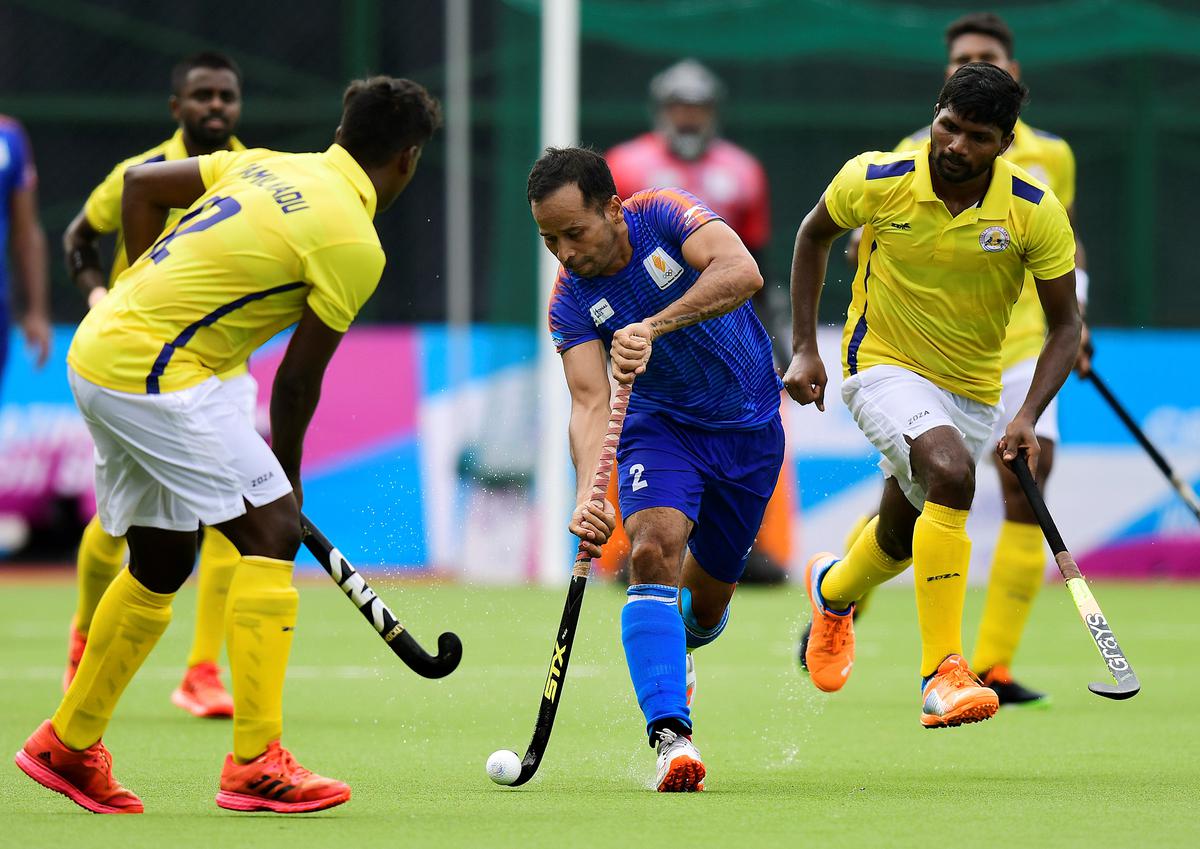 Haryana captain Bharat scores the first goal against Tamil Nadu in the hockey quarterfinal match at the 36th National Games in Rajkot on Saturday, 8 October 2022. 