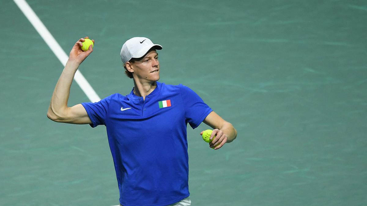 Jannik Sinner of Italy plays a forehand in his quarter final match