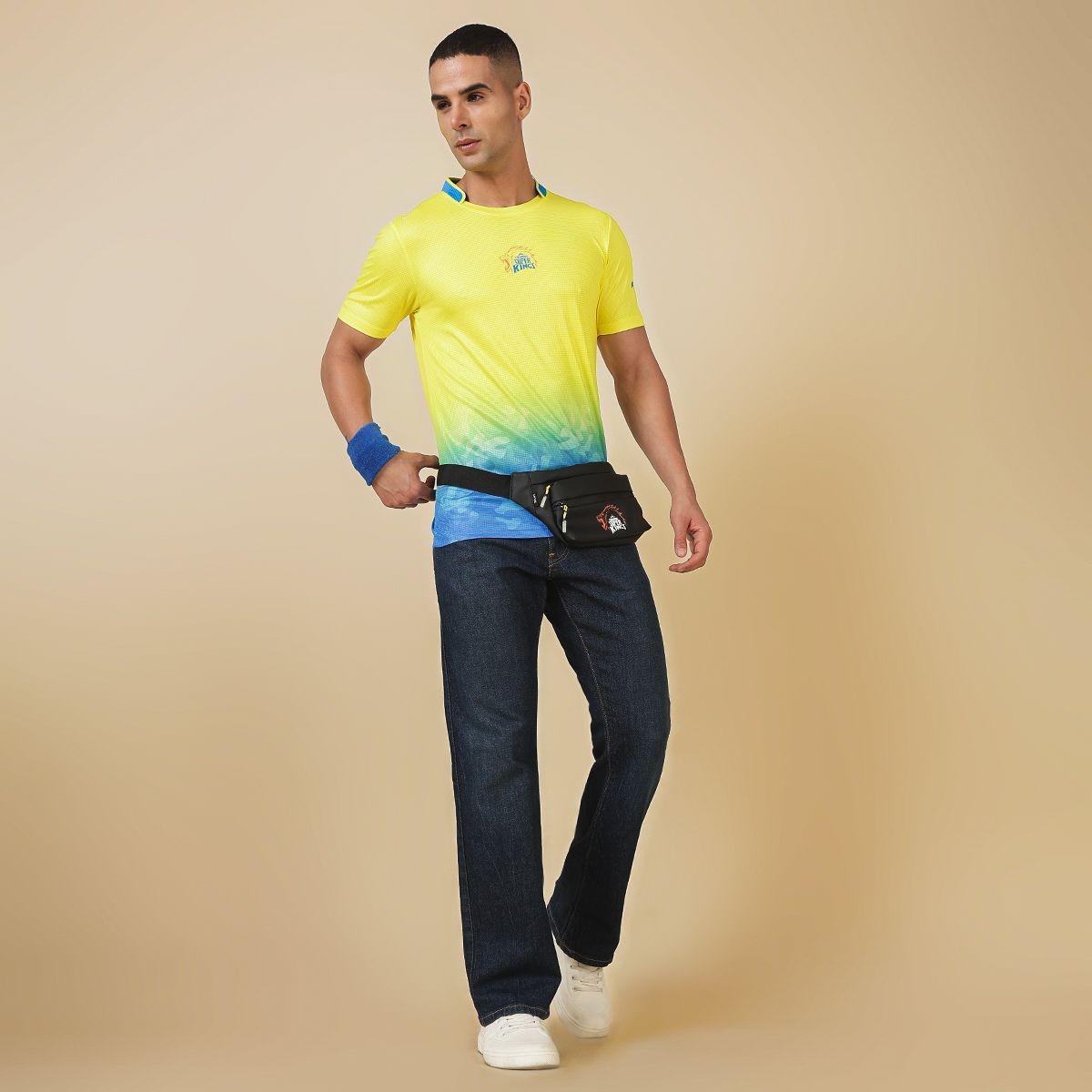 A model sporting Chennai Super Kings' merchandise from Hyve such as fan jersey and waist pouch. A model sporting Chennai Super Kings' merchandise from Hyve such as fan jersey and waist pouch.