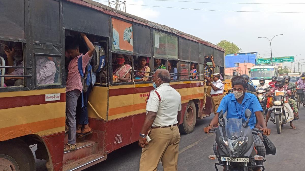 Traffic police warn students against footboard travel in buses The Hindu