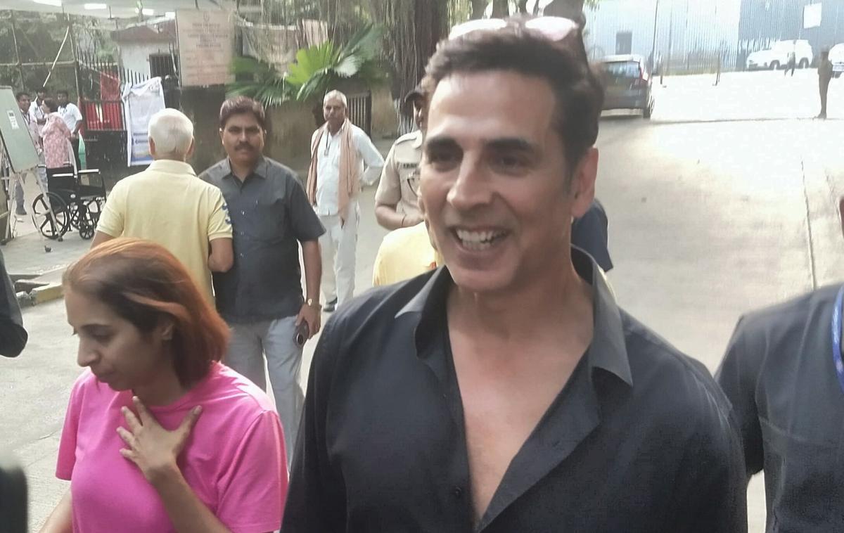 Actor Akshay Kumar interacts with the media after casting vote at a polling station during the Maharashtra Assembly elections, in Mumbai