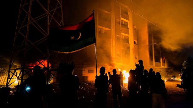 Libyan protesters storm, set fire to parliament building in Tobruk