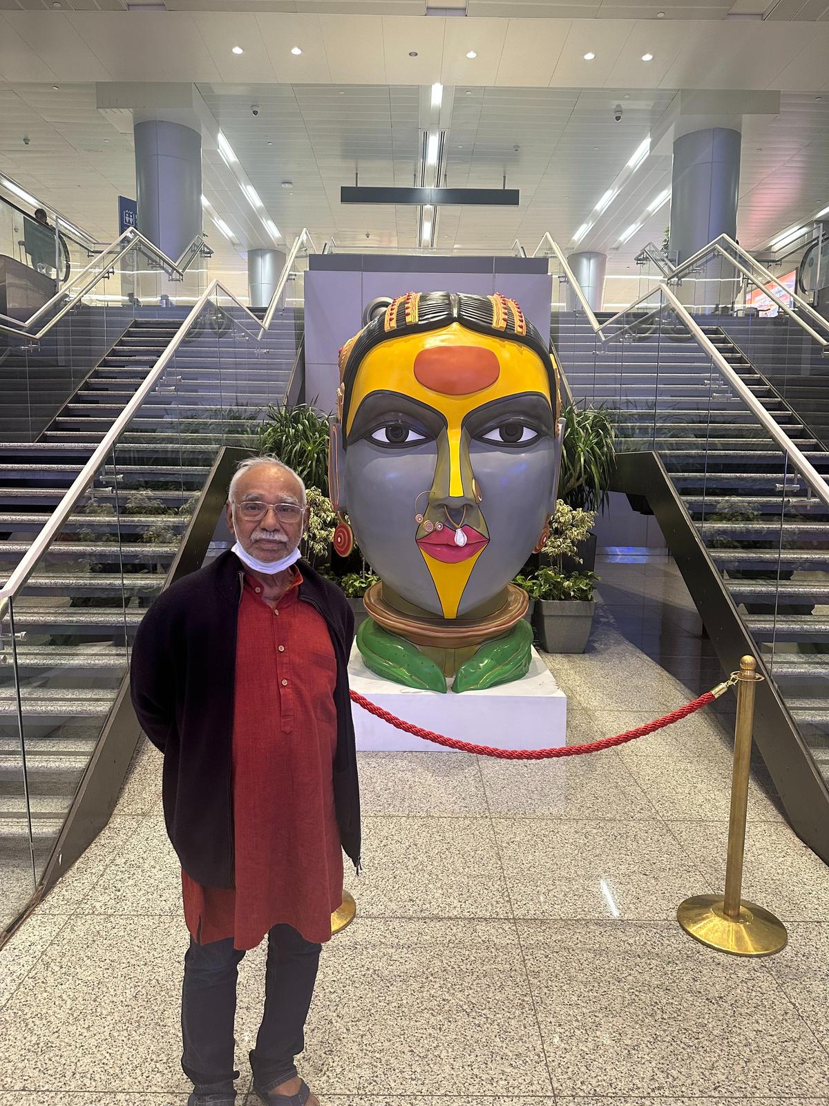 Thota Vaikuntam with one of his sculptures at the Hyderabad airport