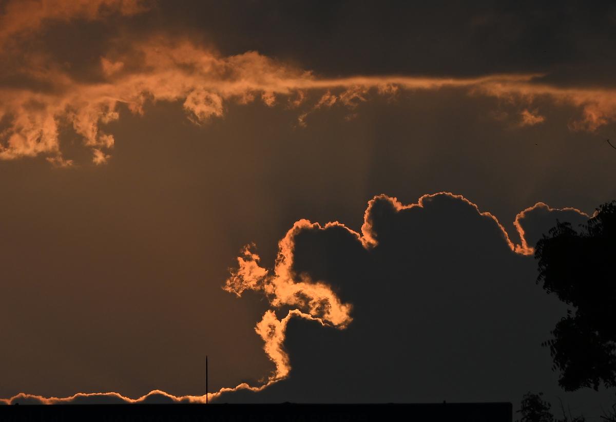 Evening clouds resemble a dragon spitting fire during the sunset time in Thiruvananthapuram on Tuesday.