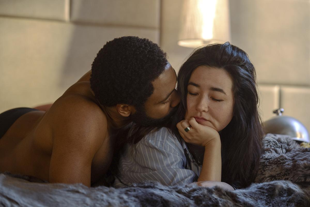Donald Glover, left, and Maya Erskine in a scene from the series ‘Mr. & Mrs. Smith’