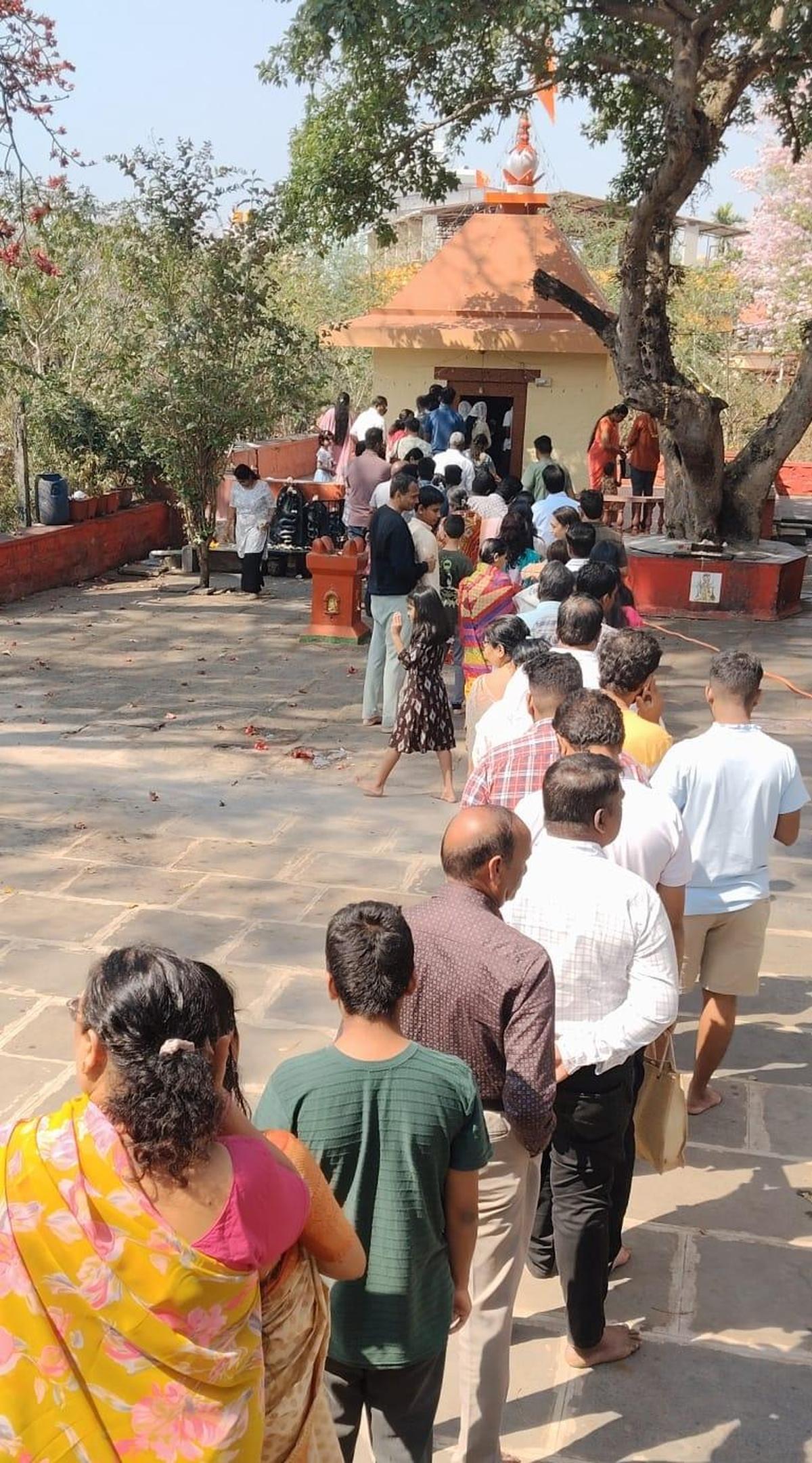 Devotees queuing up in front of the Shiva Temple in Malmaruti Extension during Mahashivaratri celebrations in Belagavi on Sunday. 