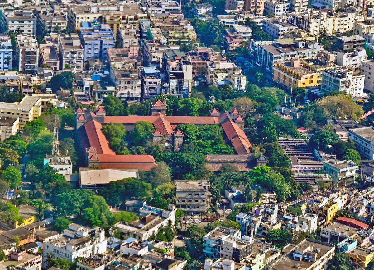 An aerial view of over a century-old Collectorate building seen amidst modern concrete jungle. The construction of the ediffice began in 1865 and was completed in 1914, and since then it has been operational as Collector’s office, in Visakhapatnam.  