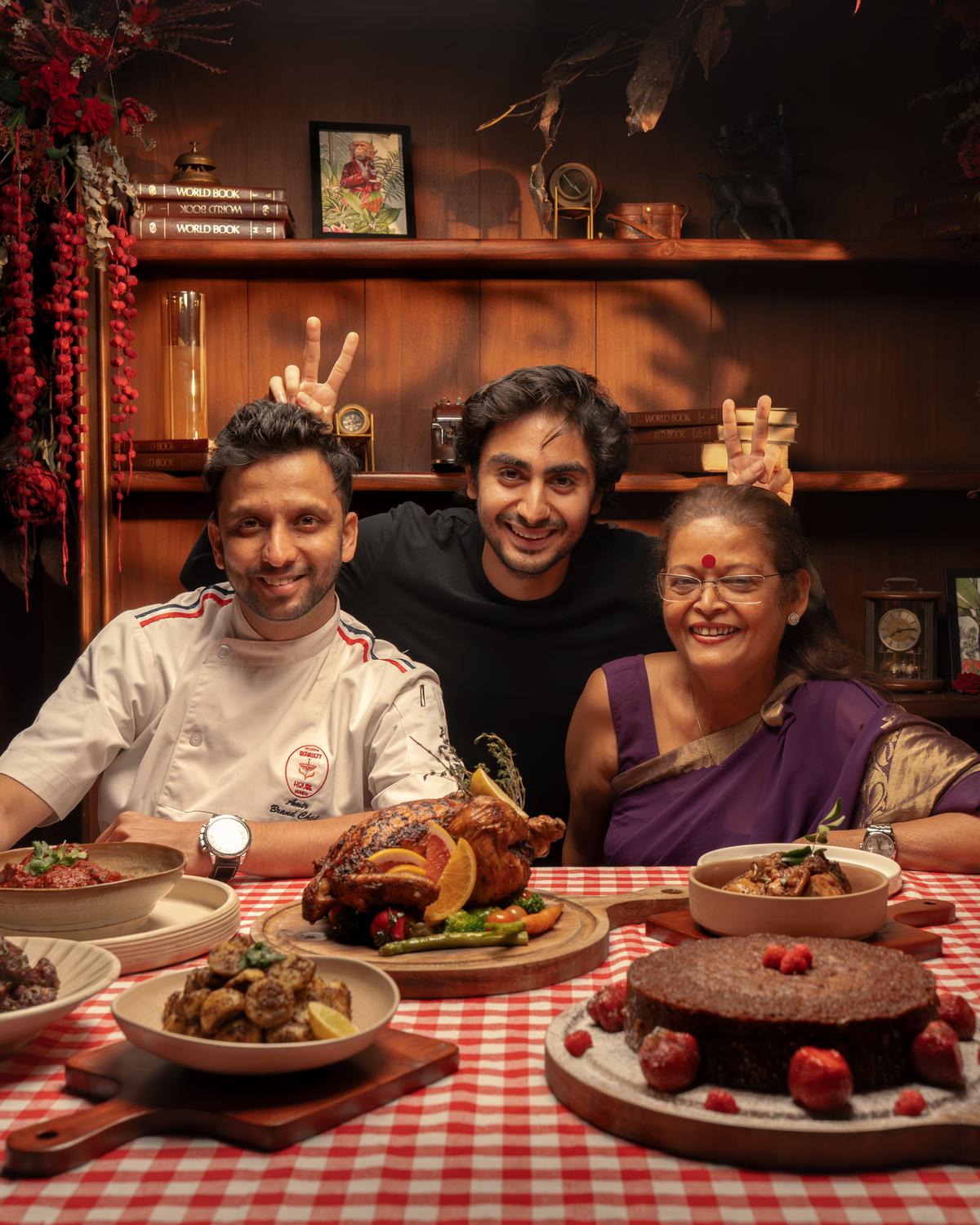 Arhaan (centre) with his grandmother Joyce and Chef Aamir Sohail of Scarlet House