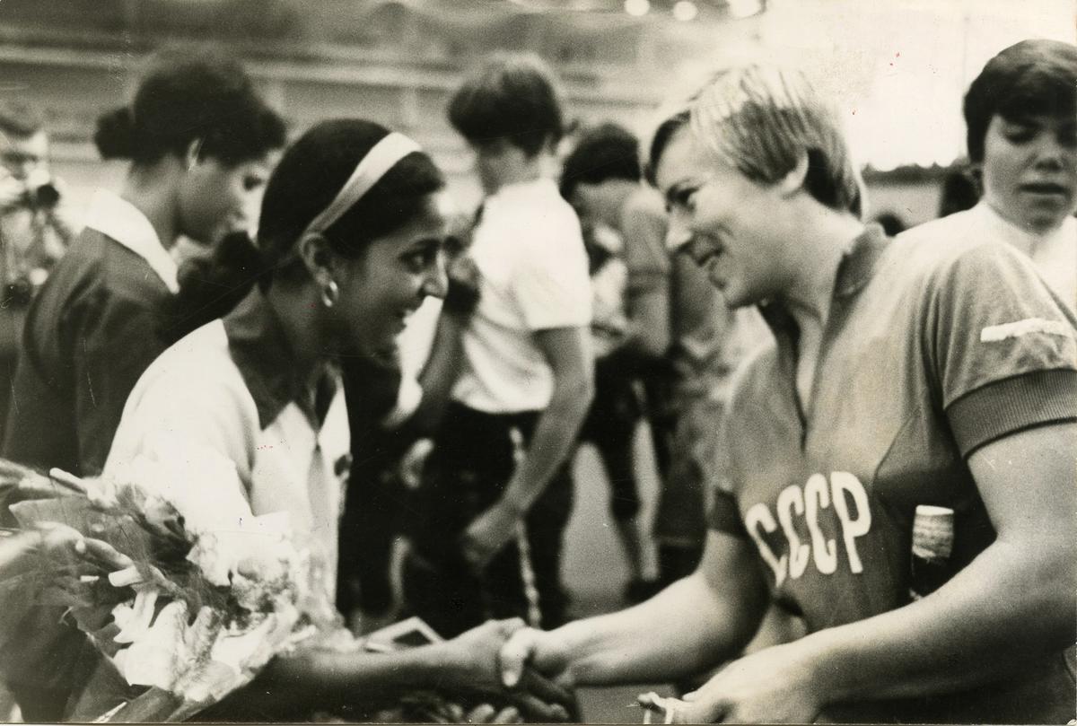 Indian woman hockey player Rekha Mundapan and Natella  Krasnikova (USSR) before a hockey match. 