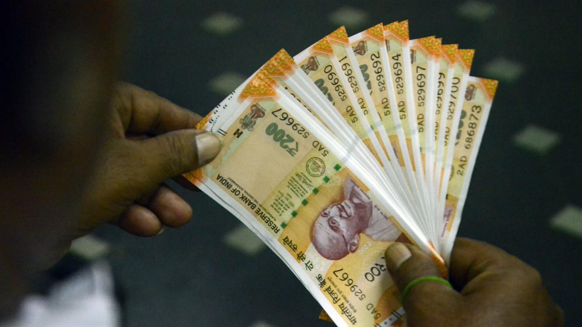 Rupee declines 3 paise to 83.15 against dollar in early trade