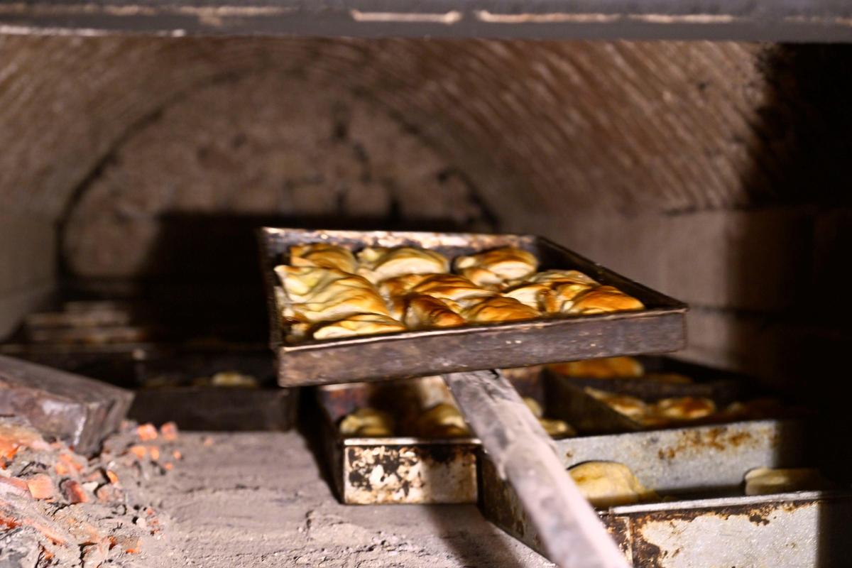  Hot puffs baked inside the brick oven in a bakery in Madurai.