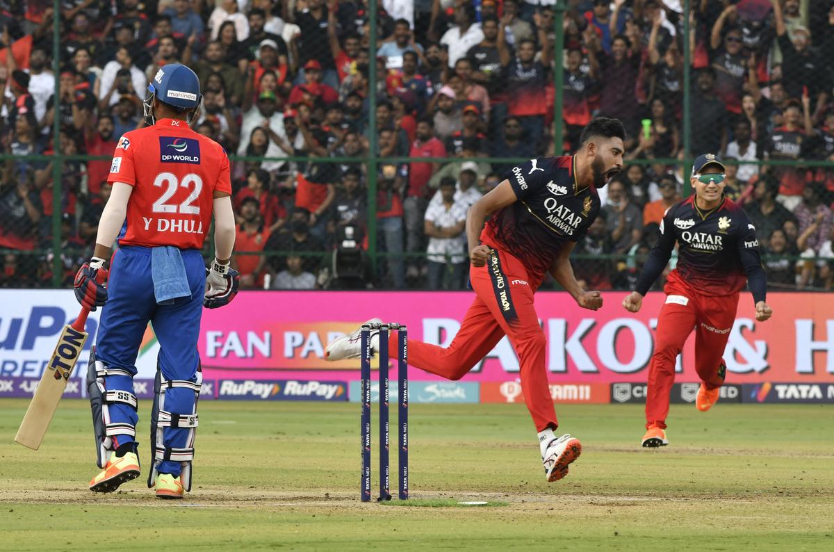 A jubilant Md. Siraj after taking the wicket of Yash Dhull  during TATA IPL 2023 between Royal Challengers and Delhi Capitals at the M. Chinnaswamy stadium in Bengaluru.