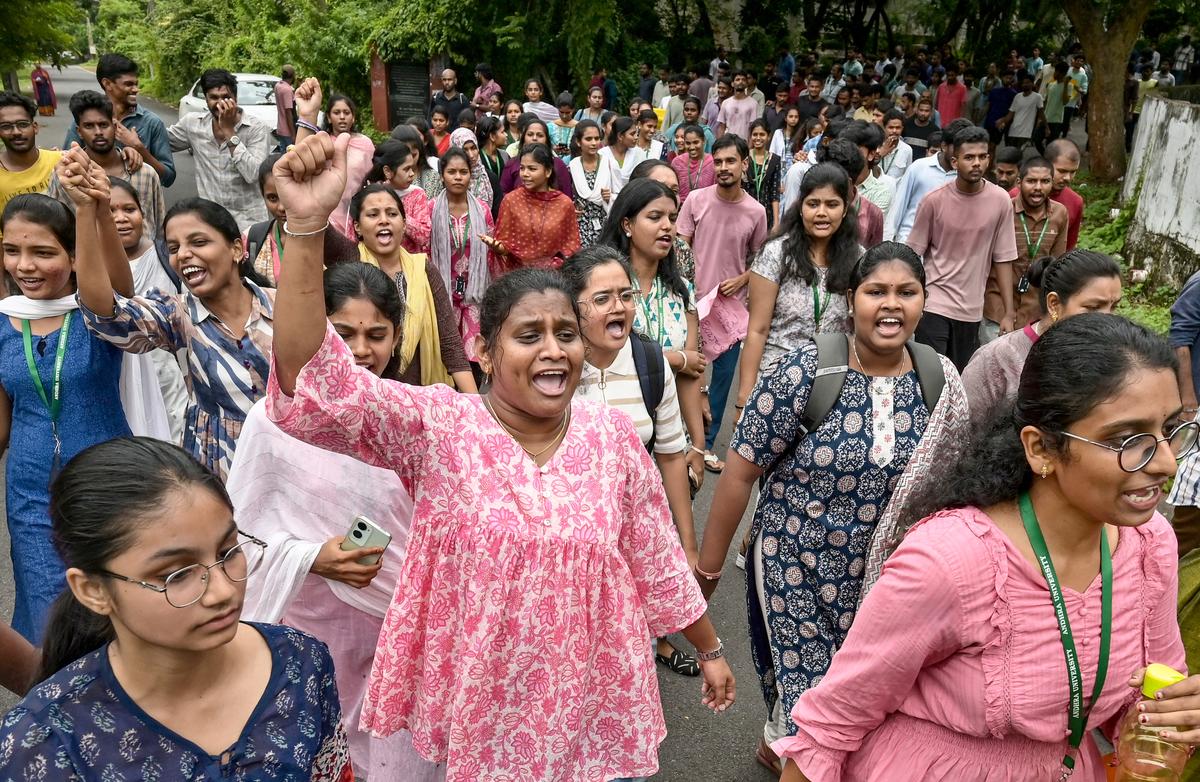 Andhra University hostelers stage a protest at the Registrar’s office on the campus in Visakhapatnam on Wednesday.