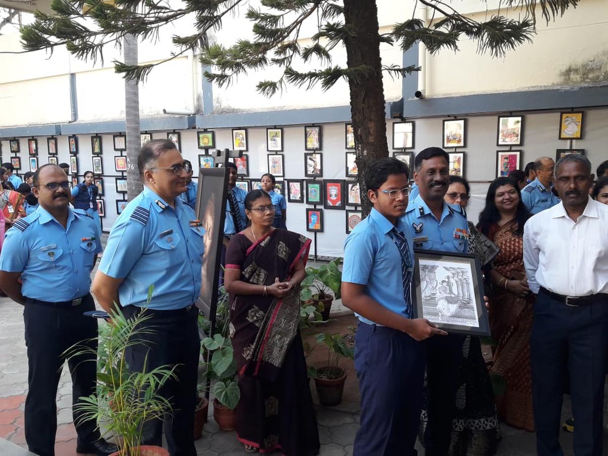Air Commodore RV Ramkishore, Commandant of Air Force Administrative College,  Coimbatore with students at AirForce School 