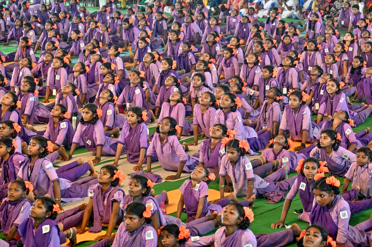 Over 22,000 tribal students participating in ‘Yogandhra’, a mass yoga session aimed at setting a Guinness record, at Andhra University Engineering College Grounds in Visakhapatnam on June 20, 2025, as a prelude to the International Yoga Day celebrations. Over 22,000 tribal students participating in ‘Yogandhra’, a mass yoga session aimed at setting a Guinness record, at Andhra University Engineering College Grounds in Visakhapatnam on June 20, 2025, as a prelude to the International Yoga Day celebrations.