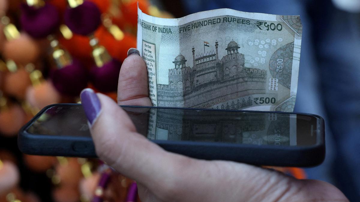 Rupee breaches 90 to a dollar, falls 6 paise in early trade