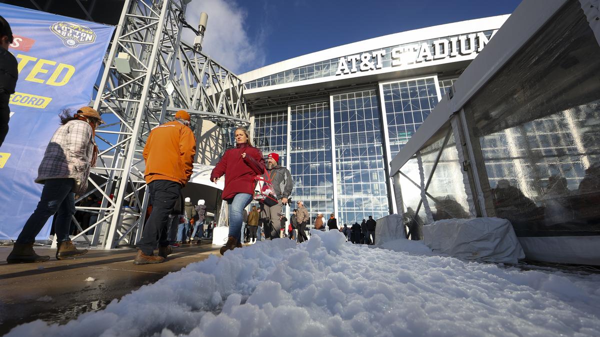 Powerful winter storm dumps heavy snow, causing flight delays, slick roads and school closings