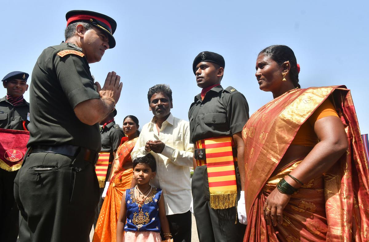 AOC Centre Commandant Brigadier Ajeet Deshpande interacting with the family members of a passing-out Agniveer.  