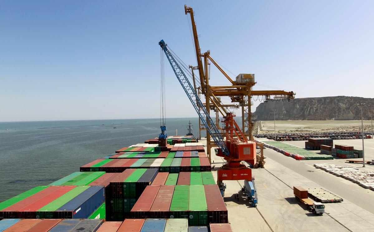 FILE PHOTO: A container is loaded onto the Cosco Wellington, the first container ship to depart after the inauguration of the China-Pakistan Economic Corridor port in Gwadar, Pakistan November 13, 2016. 