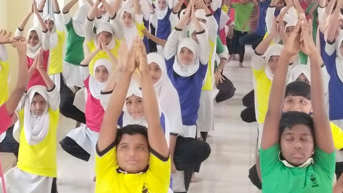 Students take part in large number in International Yoga Day celebrations in Mangaluru, Udupi