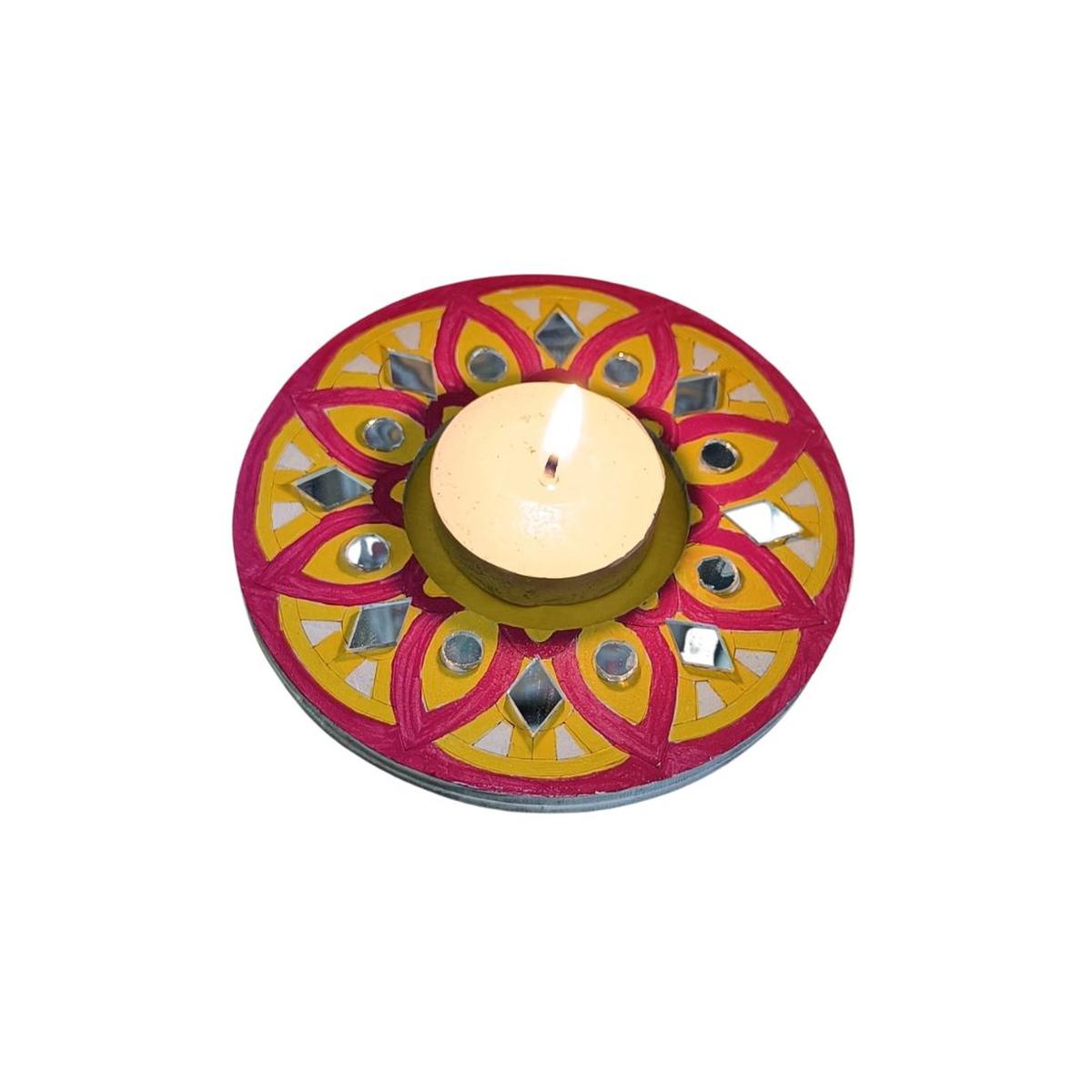 Handcrafted diya holders  made by  Vineetha Nair.  