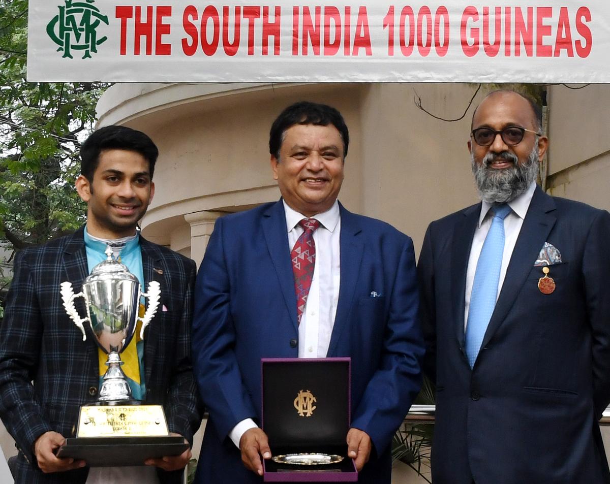 Remediesofspring’s jockey Yash Narredu and trainer J. Sebastian, centre, are all smiles after receiving the prizes from M.A.M.R. Muthiah for winning the South India 1000 Guineas at the Madras Race Club held on Saturday. 