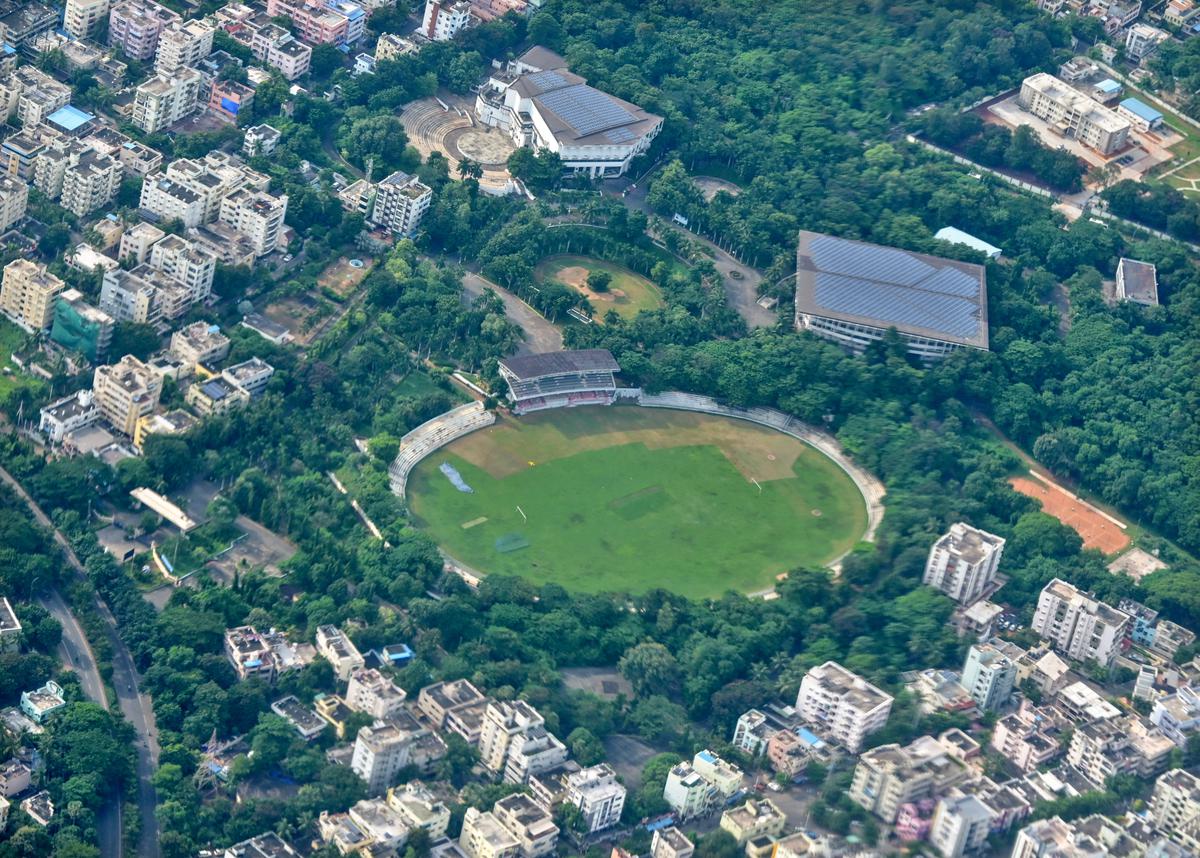 An aerial view of the Port Stadium surrounded by greenery that is getting developed into a sports hub by Vishwanadh Sports Club in Visakhapatnam.
