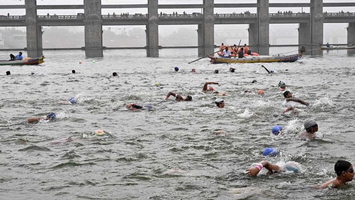 Hundreds of swimmers take part in Krishna river-crossing contest