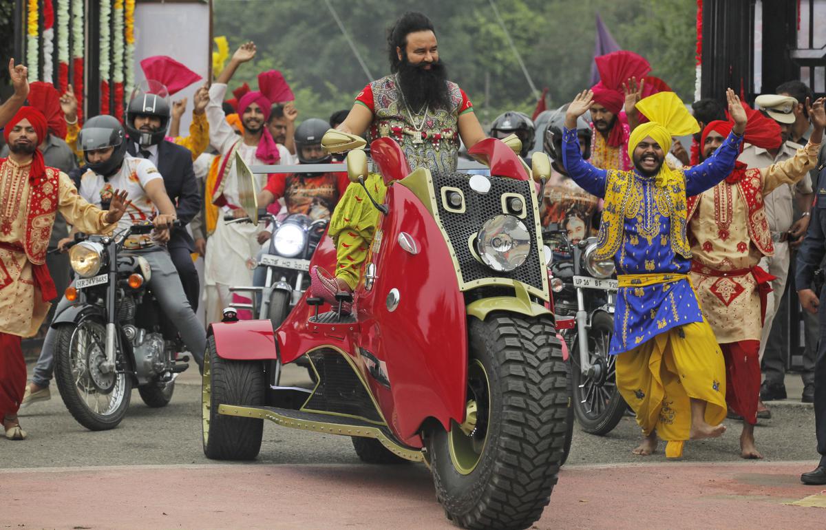 Gurmeet Ram Rahim Singh arrives for a press conference ahead of the release of his new film ‘MSG, The Warrior Lion Heart’ in New Delhi.