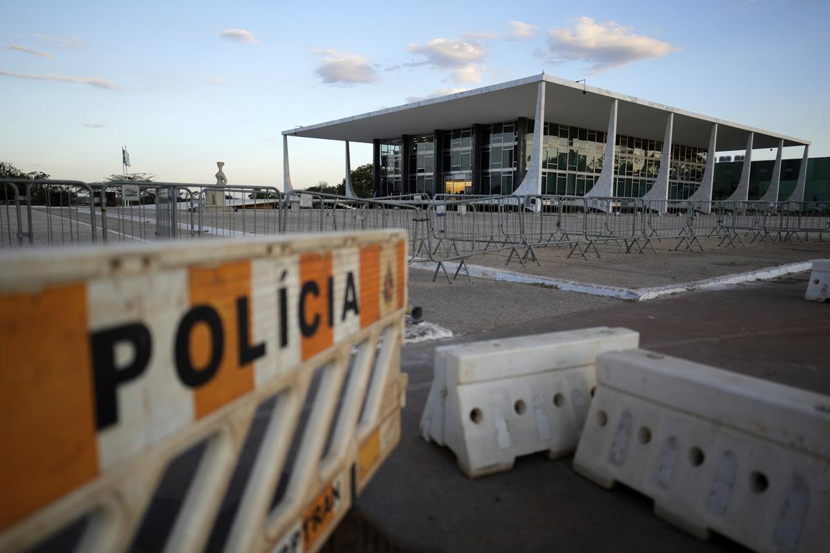 Police barriers block off access to the Supreme Court after it ordered more protection for public buildings during the trial of former President Jair Bolsonaro in a criminal case regarding an attempted coup d’état, in Brasilia, Brazil Police barriers block off access to the Supreme Court after it ordered more protection for public buildings during the trial of former President Jair Bolsonaro in a criminal case regarding an attempted coup d’état, in Brasilia, Brazil