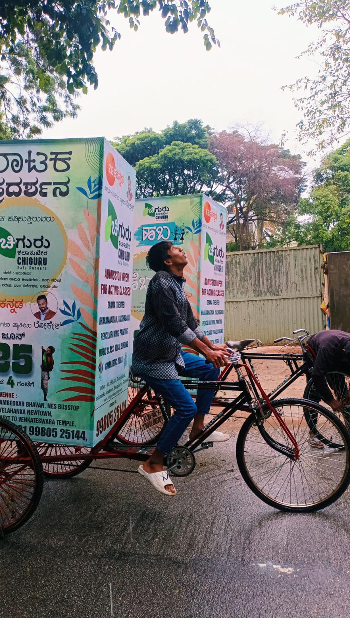 The actors cycling around Yelahanka to promote their play