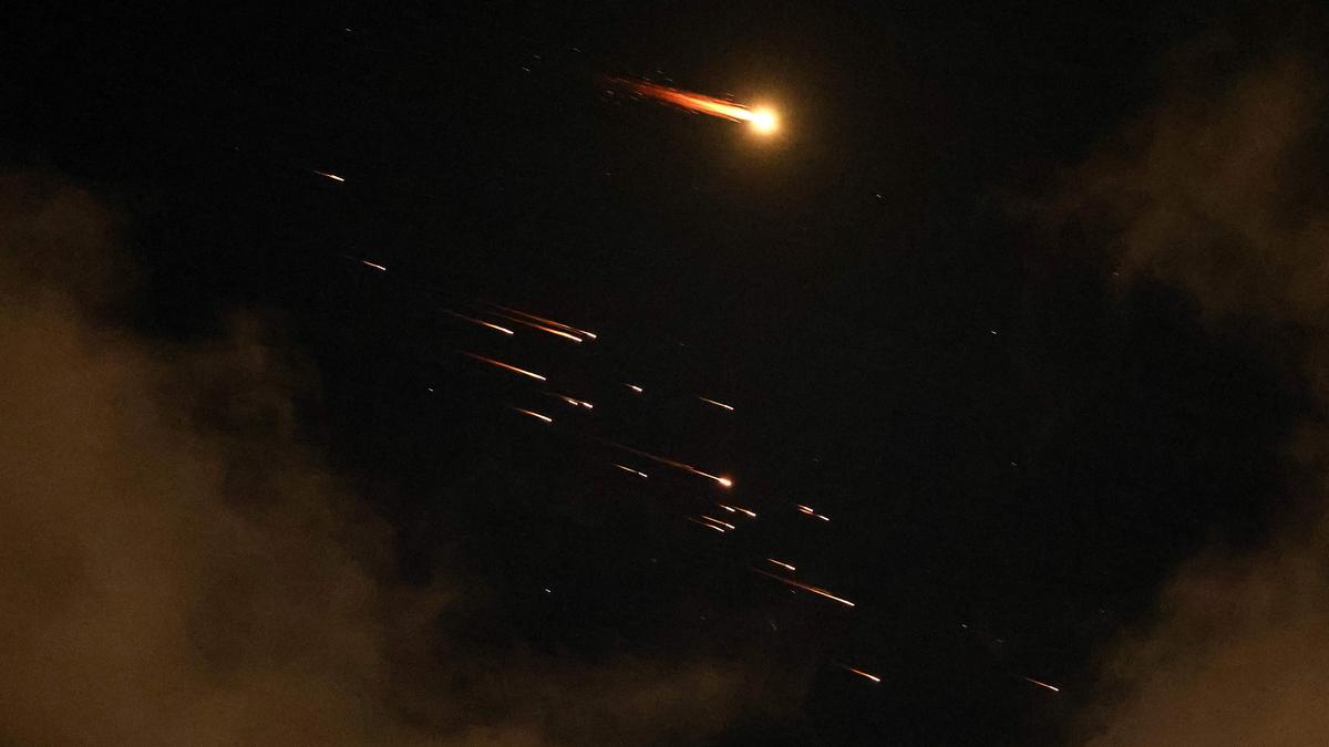 Israel says missiles fired by Iran as Trump pauses attack