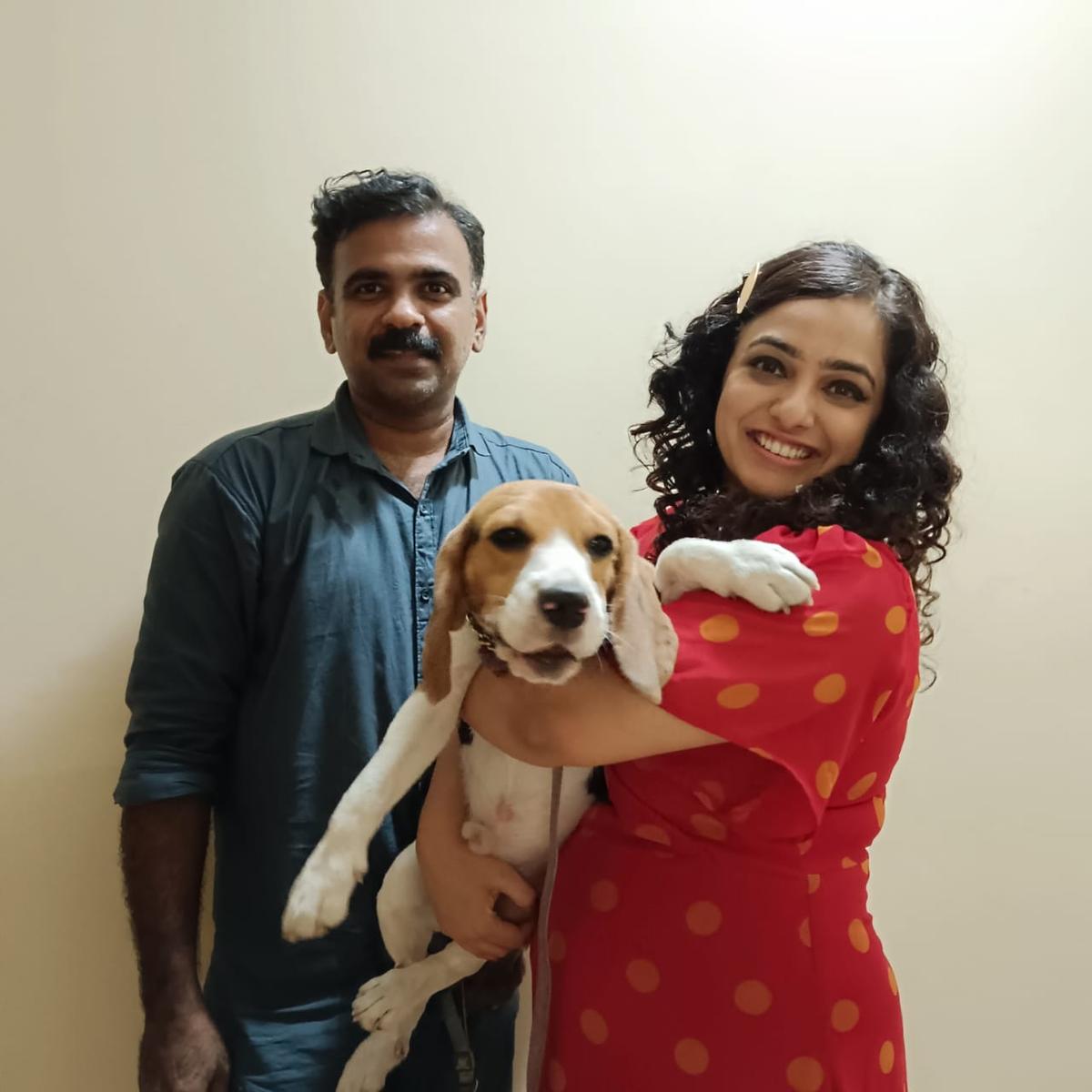 Jijesh S and his beagle, Jo, with Nithya Menen on the location of the web series Masterpeace Jijesh S and his beagle, Jo, with Nithya Menen on the location of the web series Masterpeace