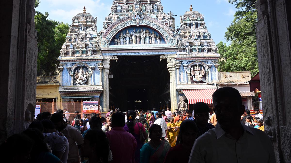 People throng temples for an auspicious start