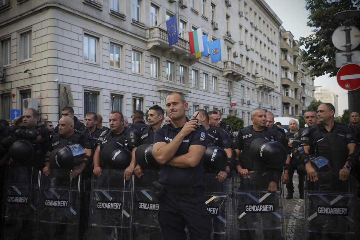 Police officers gathered on a central class of Sophia, Bulgaria as supporters of Bulgarian nationalists and supporters of Russian parties in front of Sophia Municipal Building, on Saturday, June 28, 2025, adopting the euro and demanding a referendum on the new currency to oppose the government's plans. Police officers gathered on a central class of Sophia, Bulgaria as supporters of Bulgarian nationalists and supporters of Russian parties in front of Sophia Municipal Building, on Saturday, June 28, 2025, adopting the euro and demanding a referendum on the new currency to oppose the government's plans.