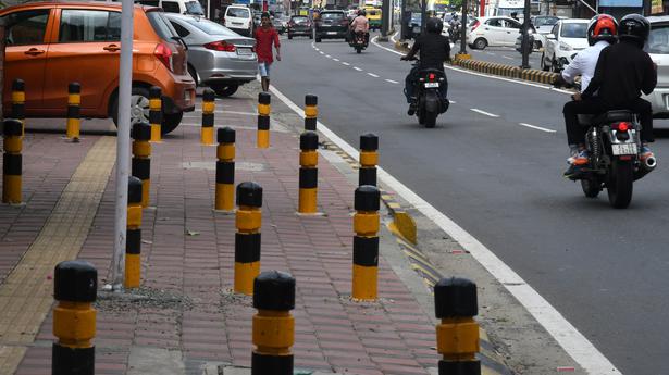 Footpaths turn parking spots in Kochi