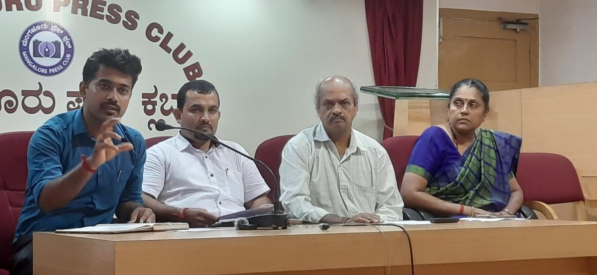 A. Chethan, Chief Executive Officer, South Canara Coconut Farmers Producer Company Ltd. (extreme left) addressing a press conference in Mangaluru on Monday. The president of the FPC S.K. Kusumadhar (second from left) is seen. 