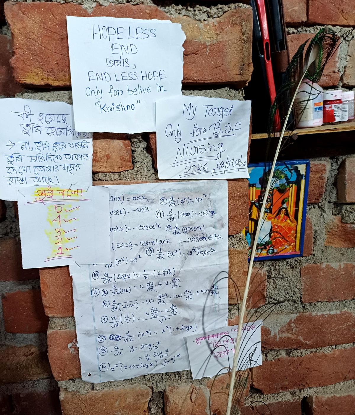 The wall in front of the reading desk of Nupur Biswas, a Class XII student and Kanyashree Warrior. A paper on the wall says Hopeless End to Endless Hope. 18 girls have been honoured as Kanyashree Warriors by the Murshidabad District Administration. 