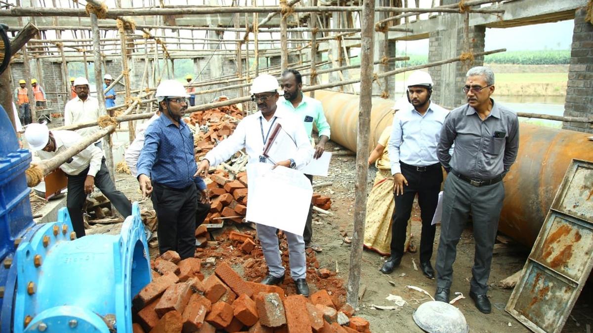 Officials inspect drinking water project