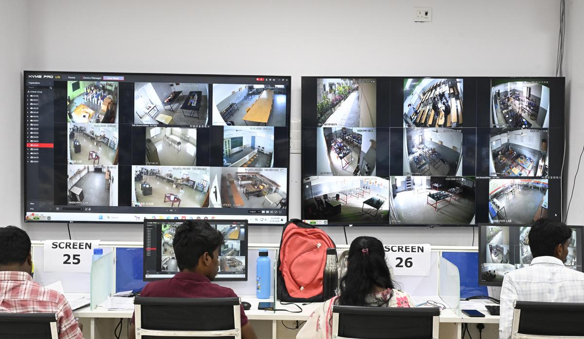 Officials monitor live CCTV feeds from intermediate colleges at the Telangana Board of Intermediate Education command centre in Hyderabad on Saturday.